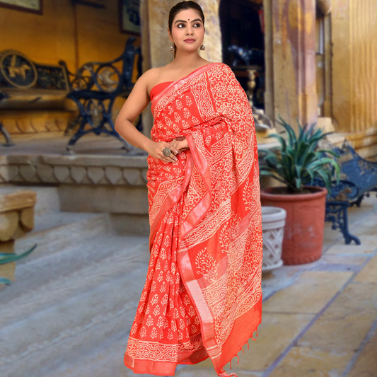 High quality designer linen saree handblock using natural dye and matching blouse in floral print in orange colour