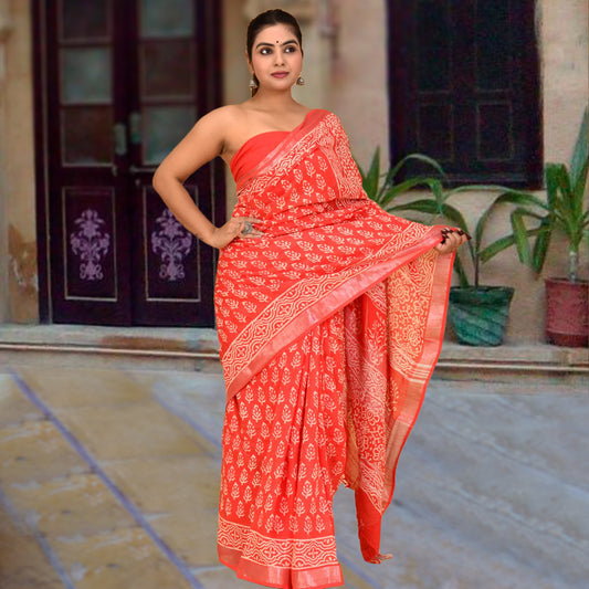 High quality designer linen saree handblock using natural dye and matching blouse in floral print in orange colour