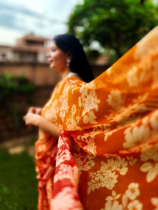 High quality designer premium chiffon saree handmade using natural dye and matching blouse in floral jaal print in orange colour online shopping india